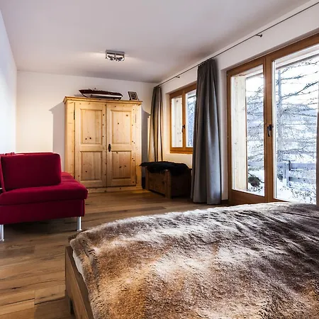 Swiss Alps Village Sarl *